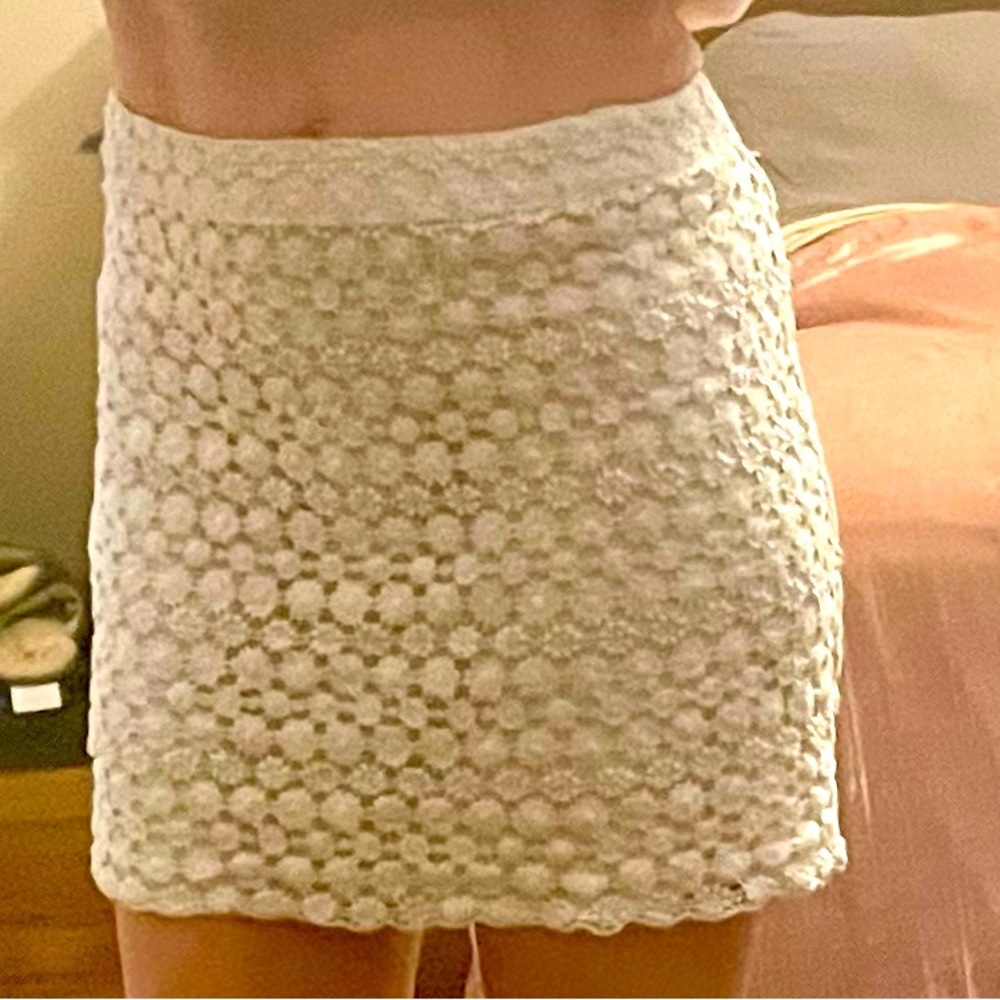 Divided white lace mini skirt size 6
